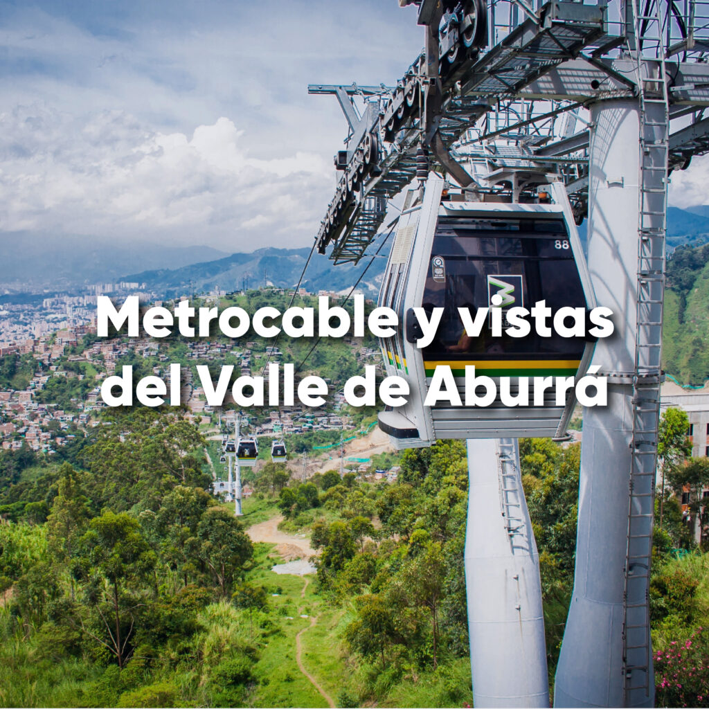 Cabinas del Metrocable de Medellín sobre el Valle de Aburrá.